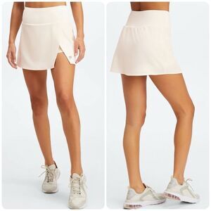 Fabletics Stow Pocket Active Performance Skort in Egret
